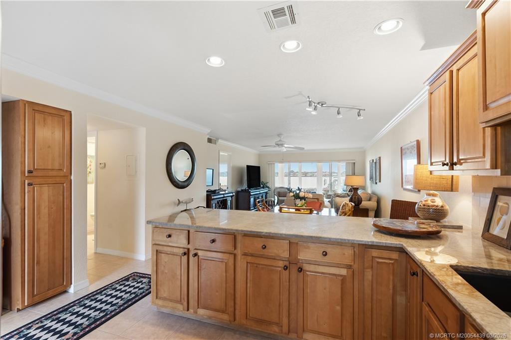 Undisclosed Address Stuart, FL 34994 - Photo 16 of 43 a kitchen with sink cabinets and window