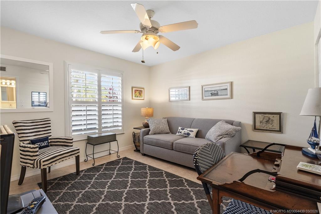 Undisclosed Address Stuart, FL 34994 - Photo 24 of 43 a living room with furniture and a window
