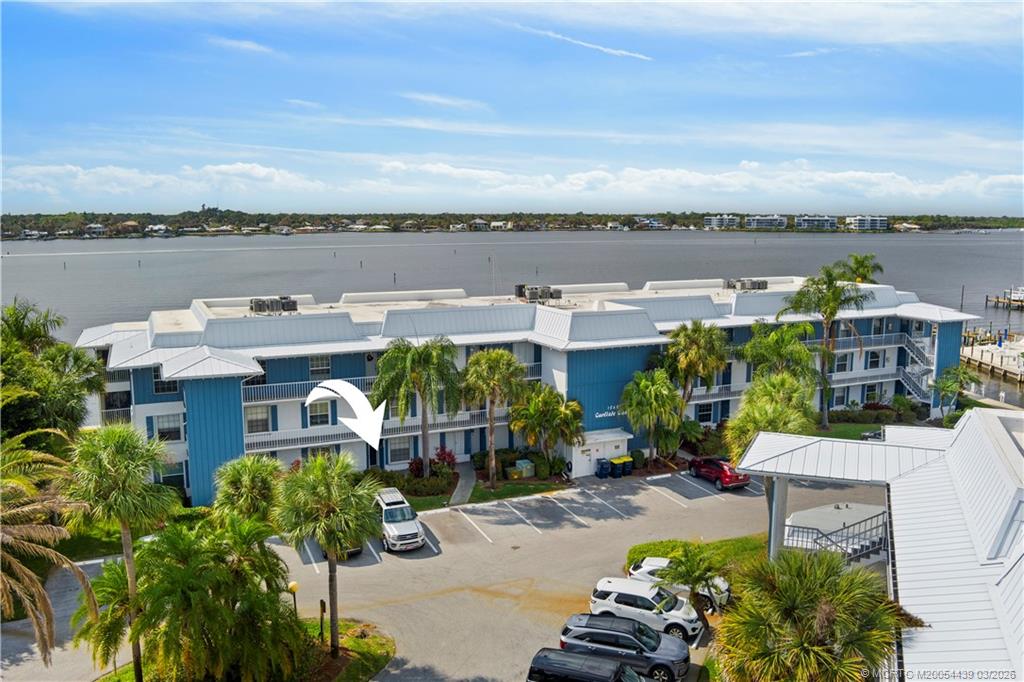 Undisclosed Address Stuart, FL 34994 - Photo 35 of 43 a picture of city view with lake view and boat in the back