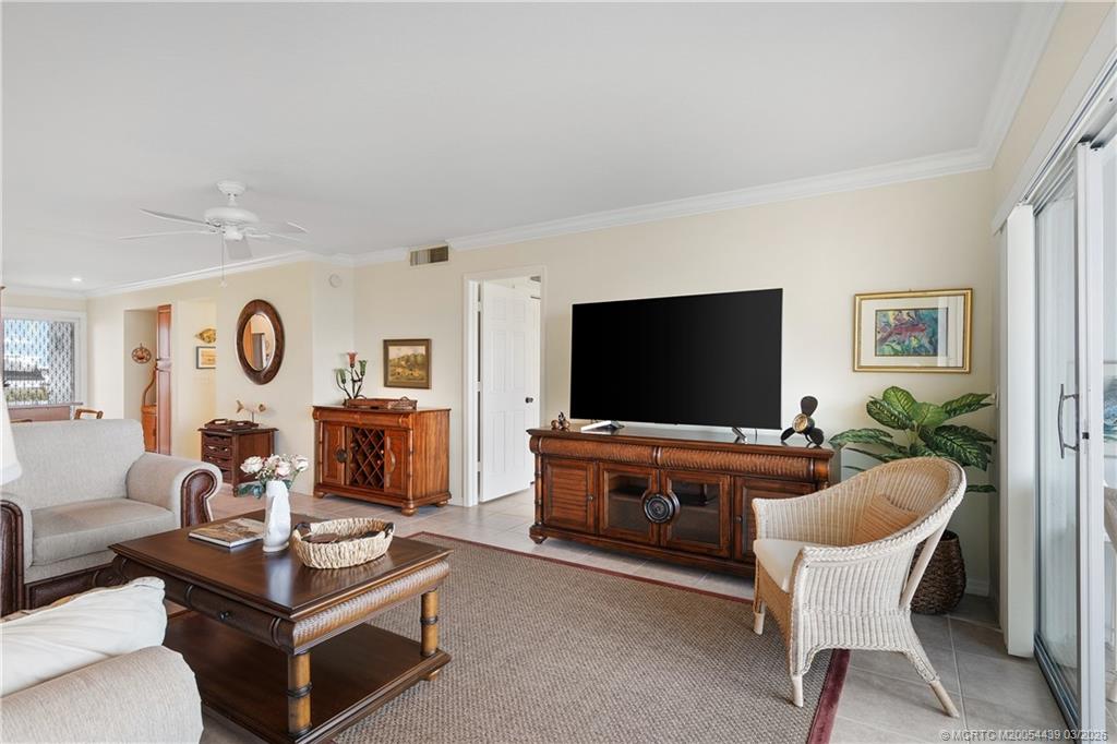 Undisclosed Address Stuart, FL 34994 - Photo 6 of 43 a living room with furniture and a flat screen tv