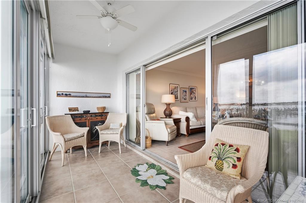 Undisclosed Address Stuart, FL 34994 - Photo 10 of 43 a living room with furniture and a window