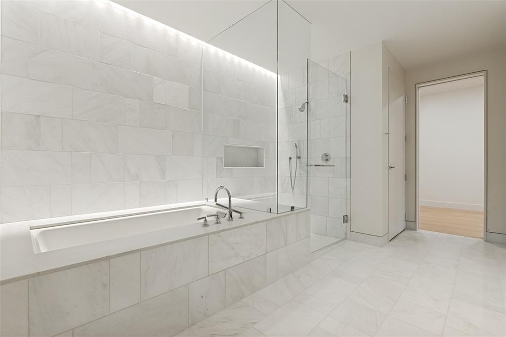 1747 Leonard Street, Unit 2002 Dallas, TX 75201 - Photo 11 of 33 a bathroom with a sink and a shower