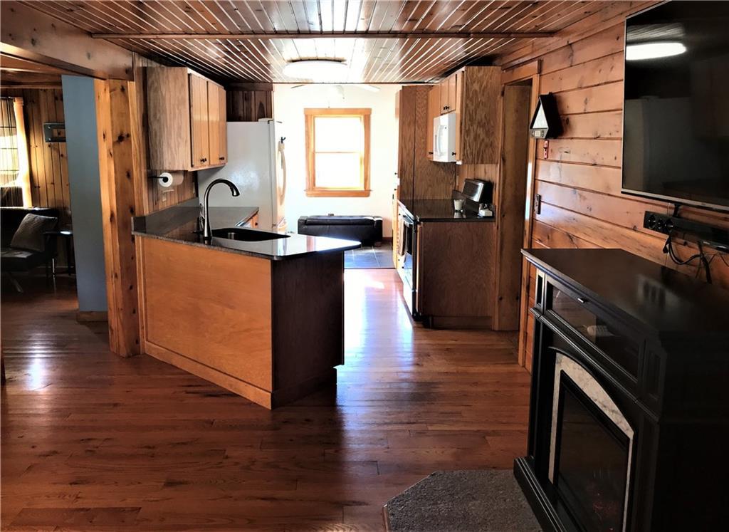 292 Springy Pond Road Clifton, ME 04428 - Photo 10 of 27 View of Kitchen from Sunroom