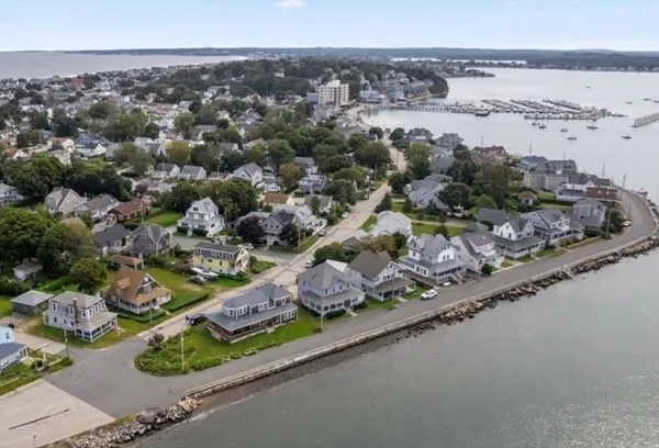 a view of a swimming pool with a garden