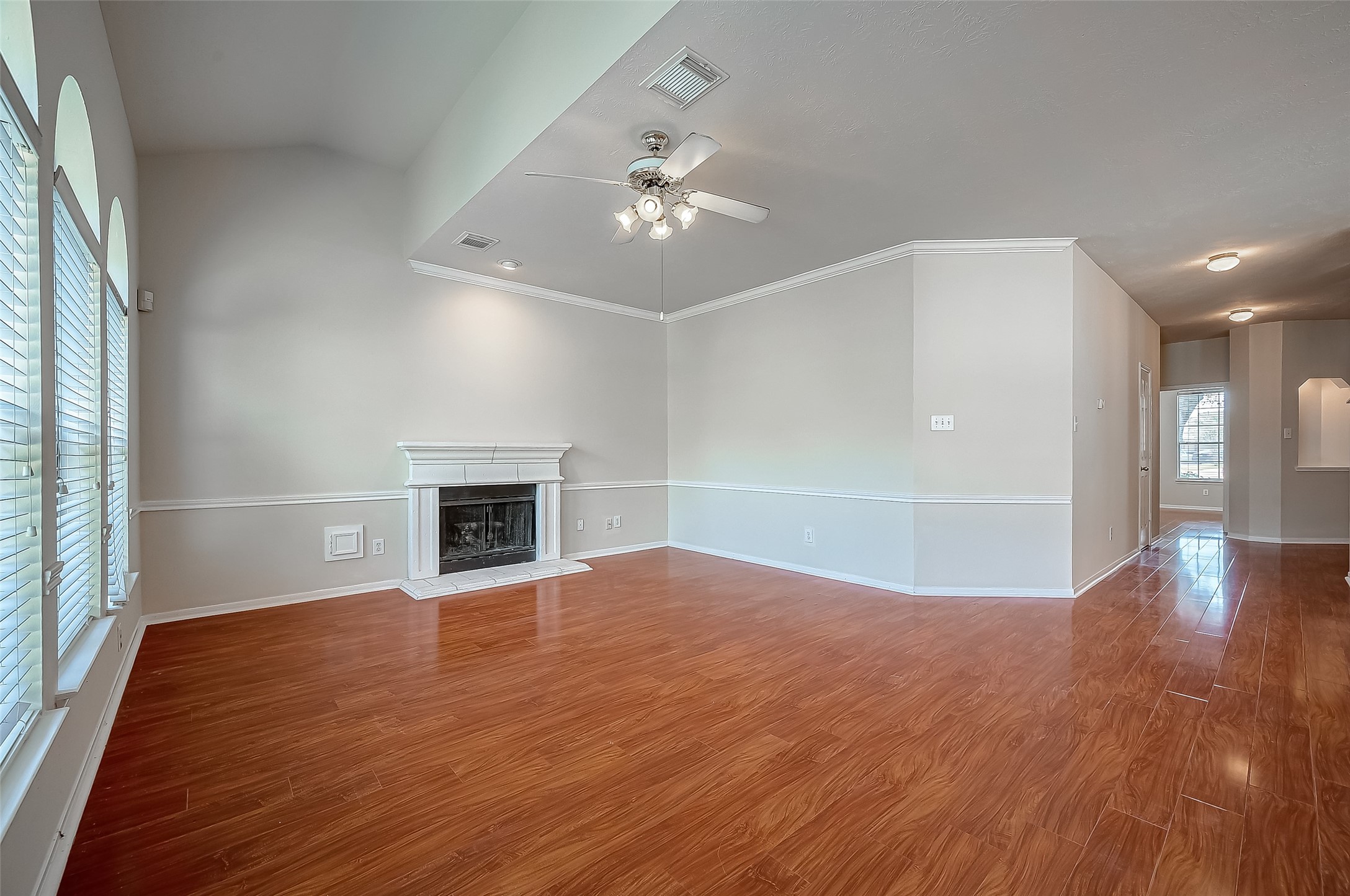 2907 Little Branch Court Houston, TX 77082 - Photo 12 of 50 wooden floor in an empty room with a window