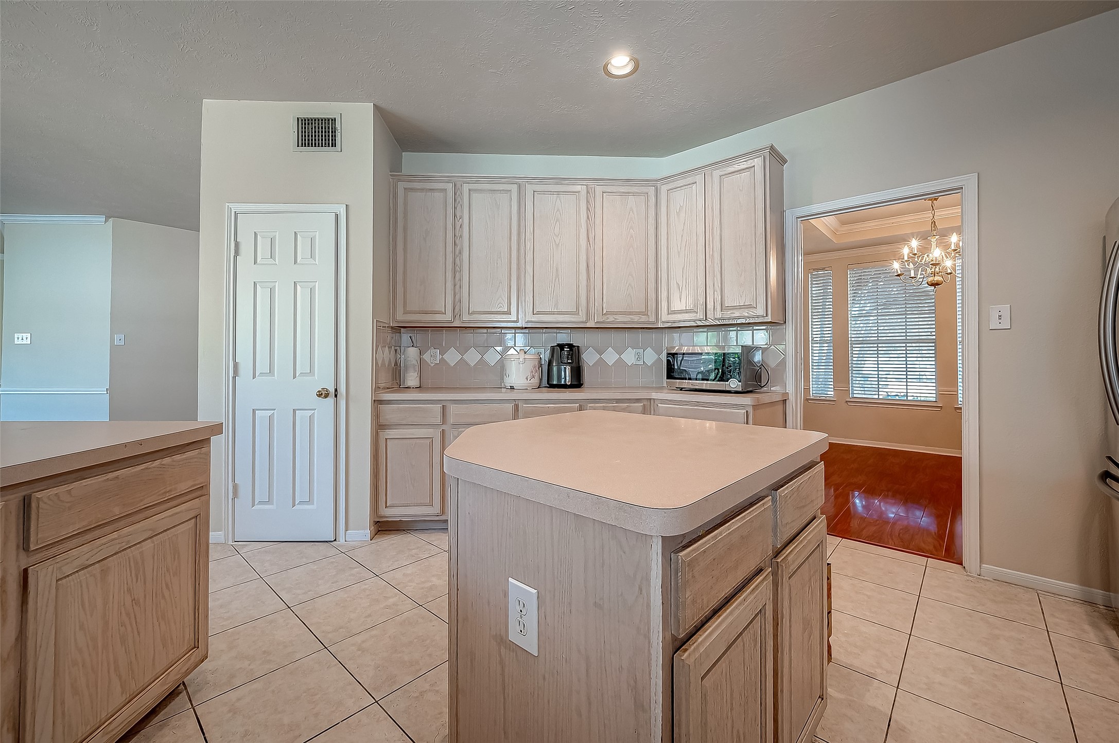 2907 Little Branch Court Houston, TX 77082 - Photo 20 of 50 a kitchen with a stove a sink and a refrigerator