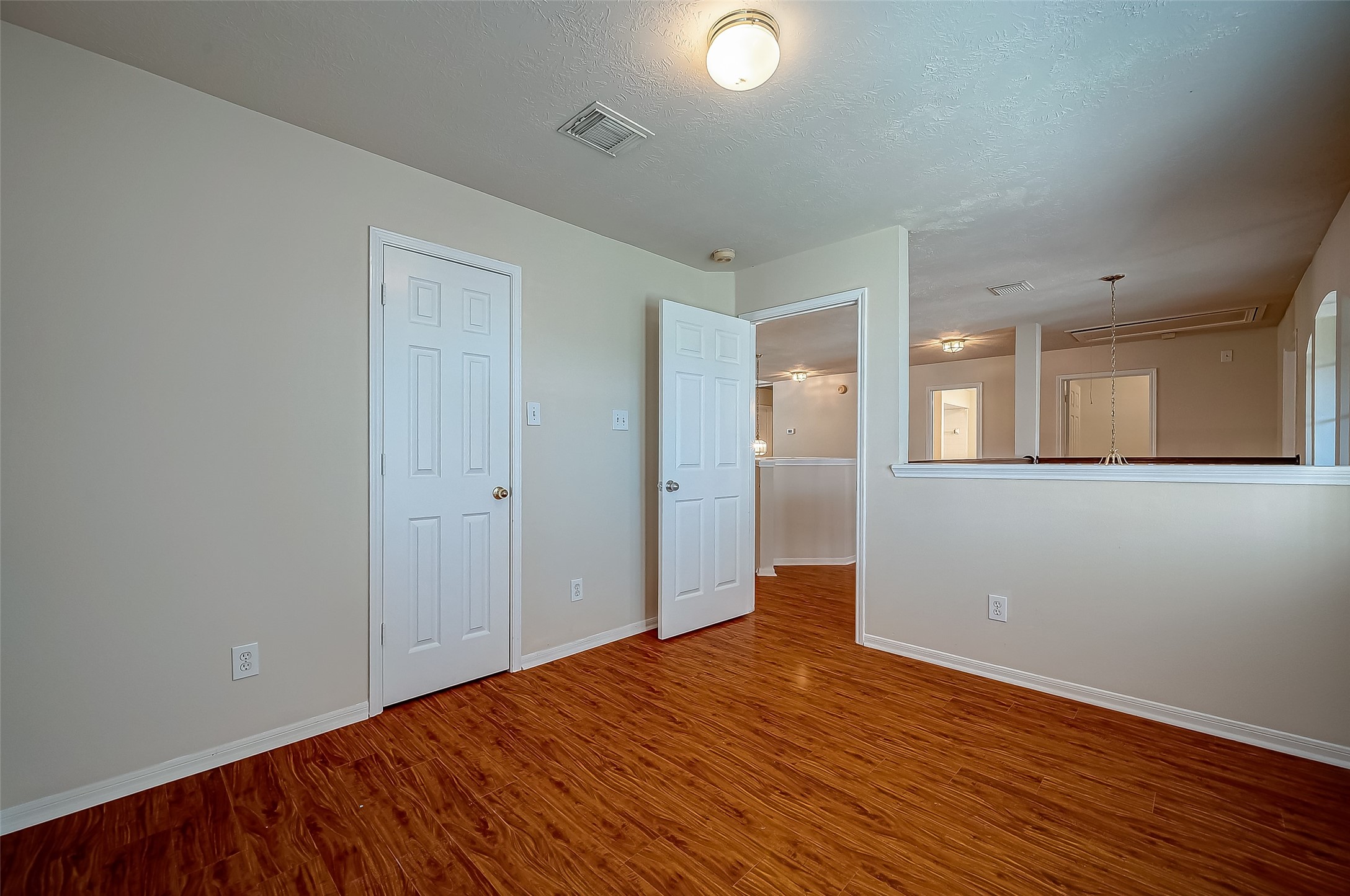 2907 Little Branch Court Houston, TX 77082 - Photo 25 of 50 a view of a room with wooden floor and a window