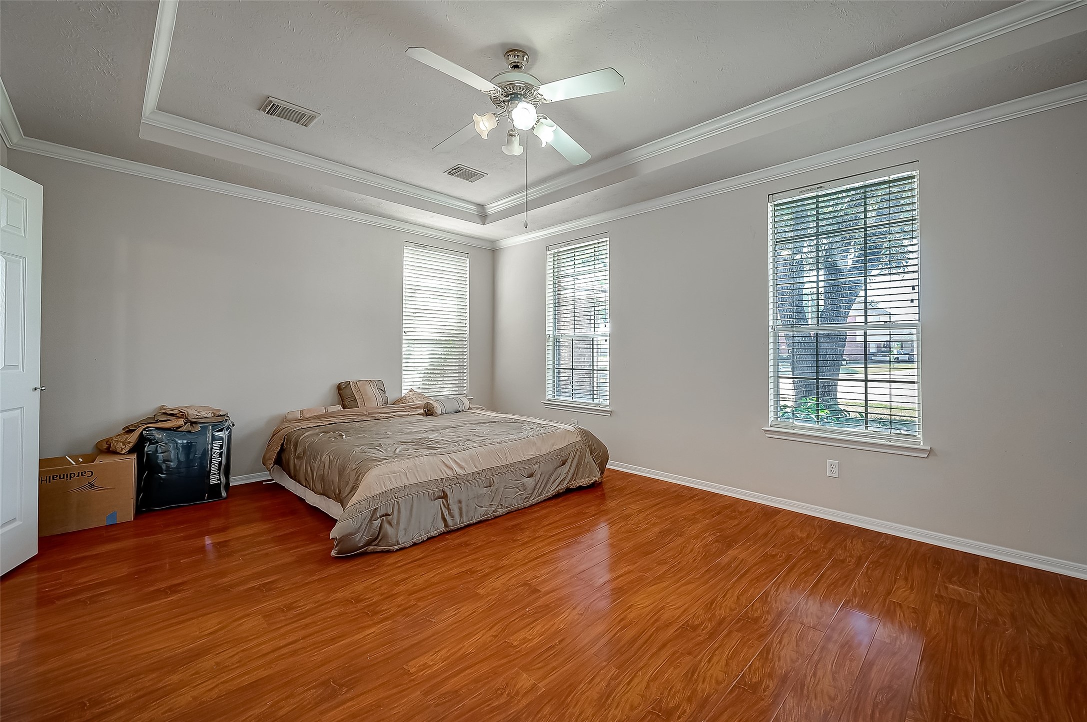 2907 Little Branch Court Houston, TX 77082 - Photo 37 of 50 a spacious bedroom with a bed and a ceiling fan