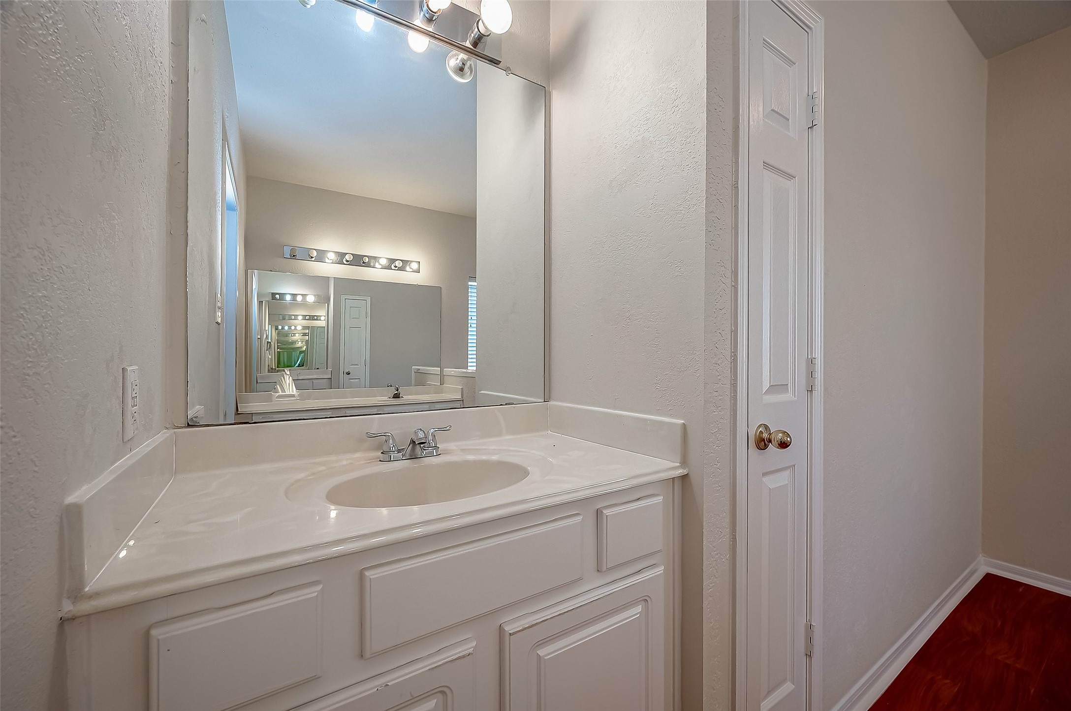 2907 Little Branch Court Houston, TX 77082 - Photo 40 of 50 a bathroom with a sink and a mirror