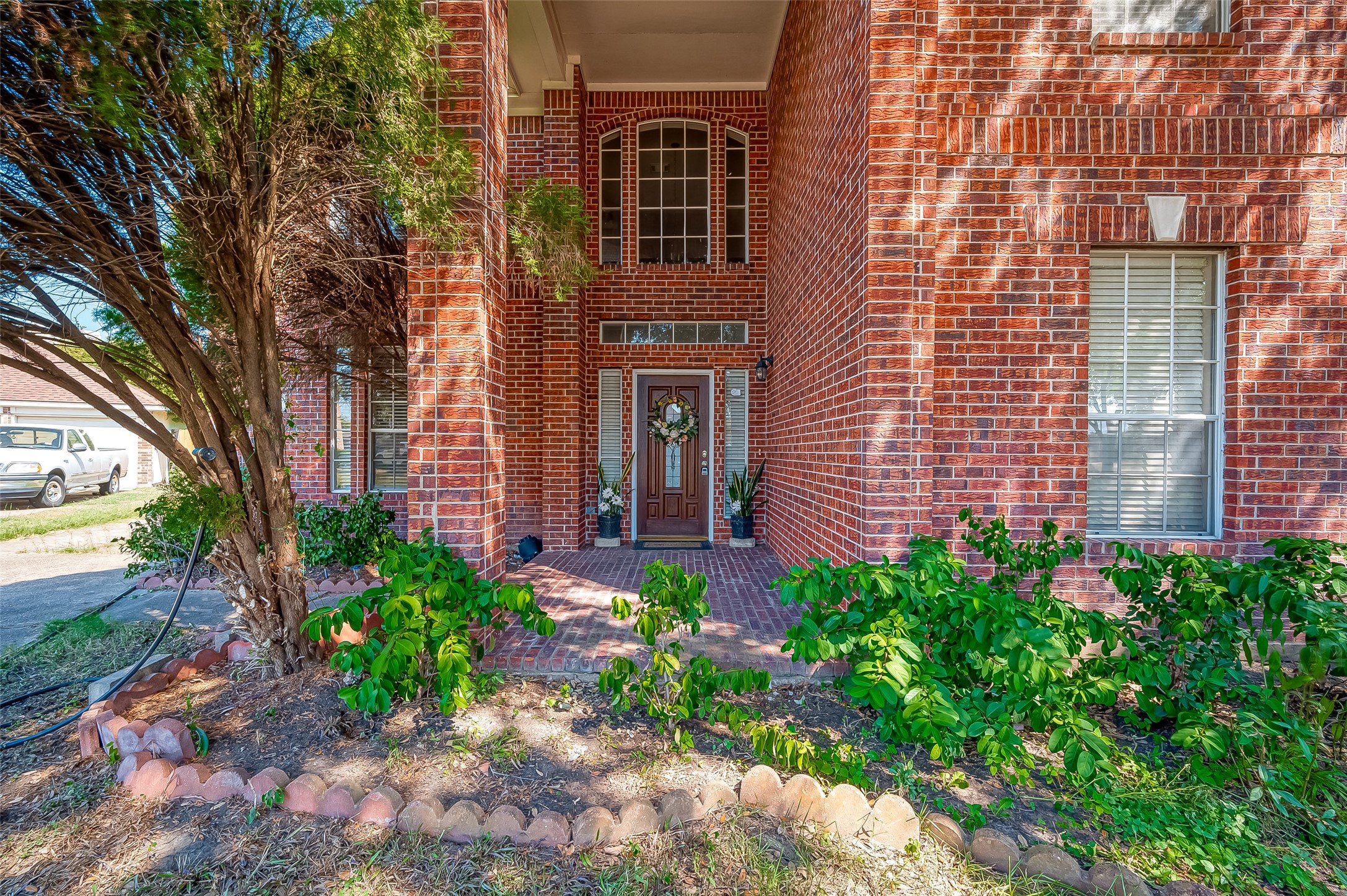 2907 Little Branch Court Houston, TX 77082 - Photo 4 of 50 a front view of a house with a yard