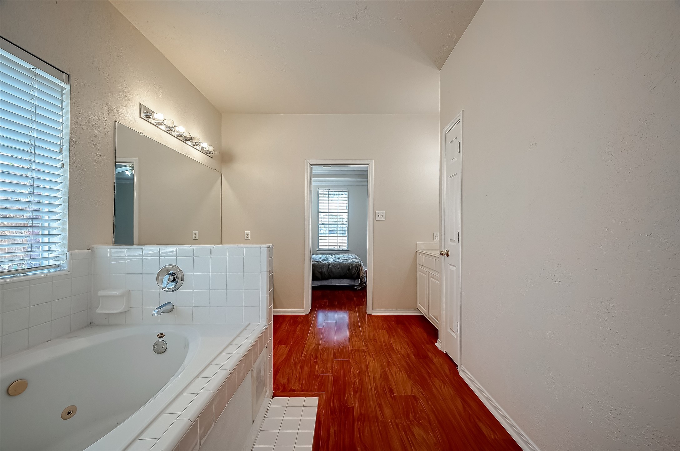 2907 Little Branch Court Houston, TX 77082 - Photo 46 of 50 a bathroom with a bathtub and a shower