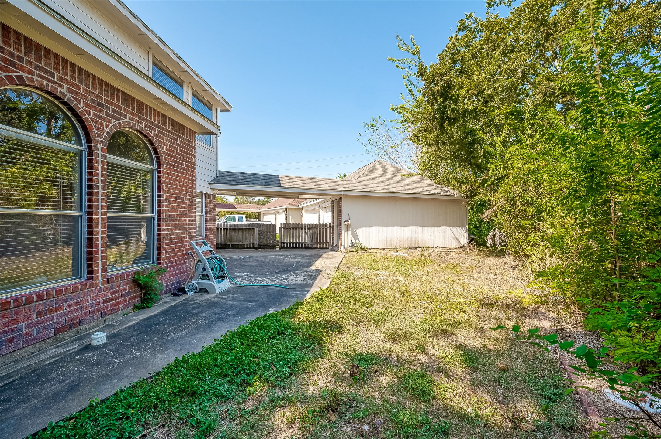 2907 Little Branch Court Houston, TX 77082 - Photo 49 of 50 a view of a house with backyard and porch