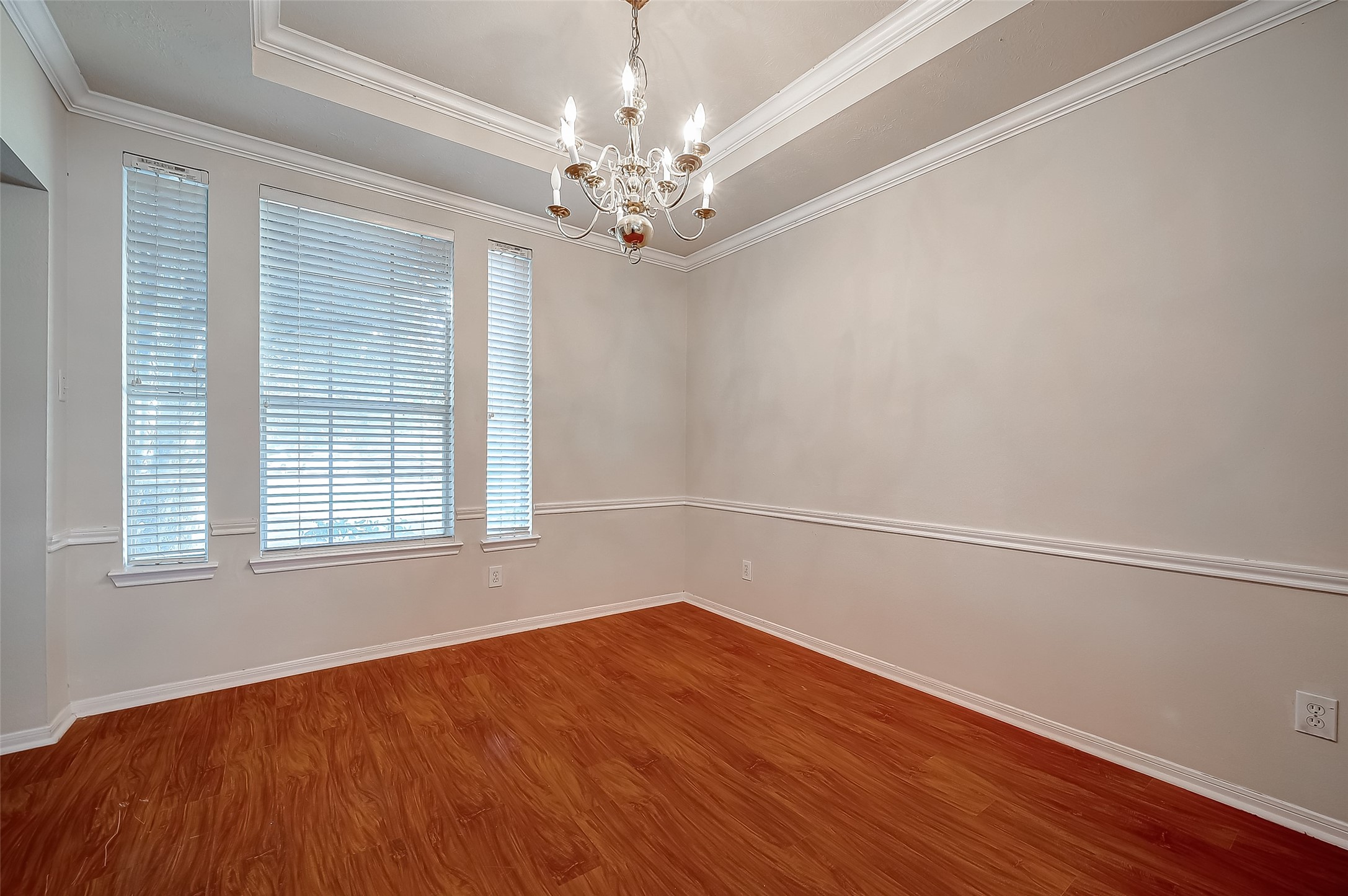2907 Little Branch Court Houston, TX 77082 - Photo 8 of 50 wooden floor in an empty room with a window
