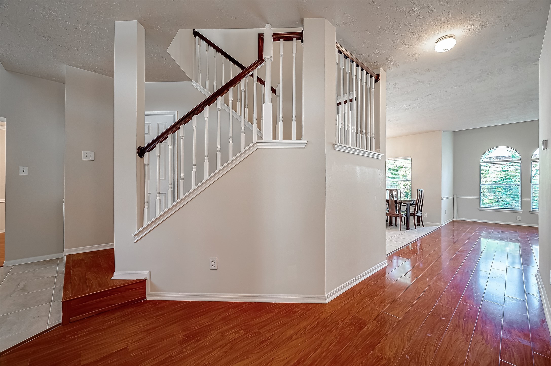 2907 Little Branch Court Houston, TX 77082 - Photo 10 of 50 a view of entryway with wooden floor and stairs