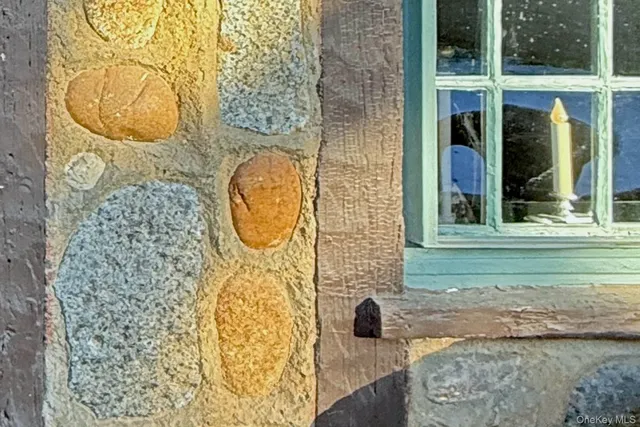 a bathroom with a tub and shower