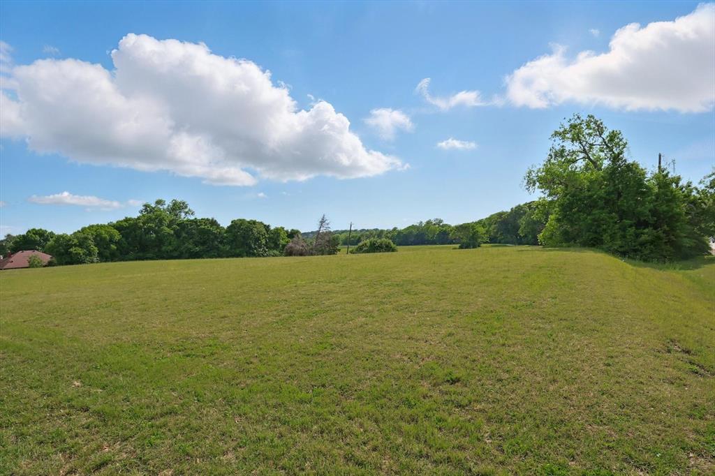 699 West Wintergreen Road DeSoto, TX 75115 - Photo 13 of 29 a view of a lake and mountain in the back