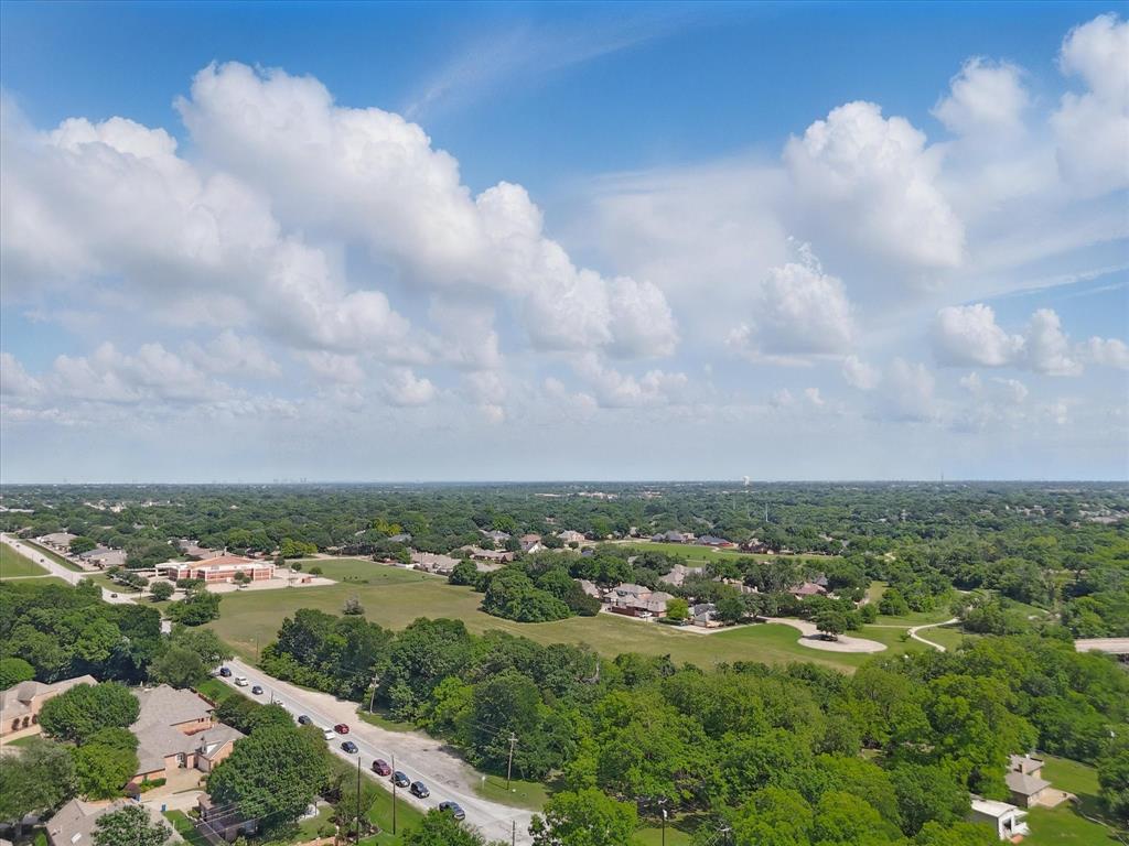 699 West Wintergreen Road DeSoto, TX 75115 - Photo 15 of 29 a view of a city with lots of trees