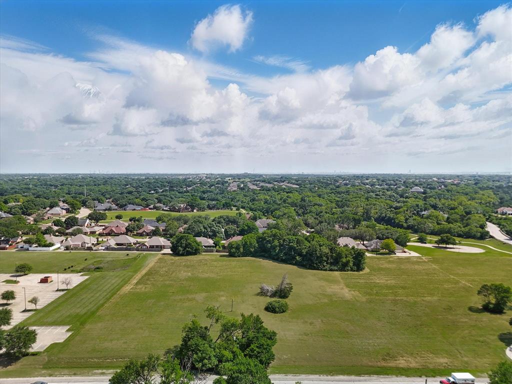 699 West Wintergreen Road DeSoto, TX 75115 - Photo 19 of 29 an aerial view of residential houses with outdoor space