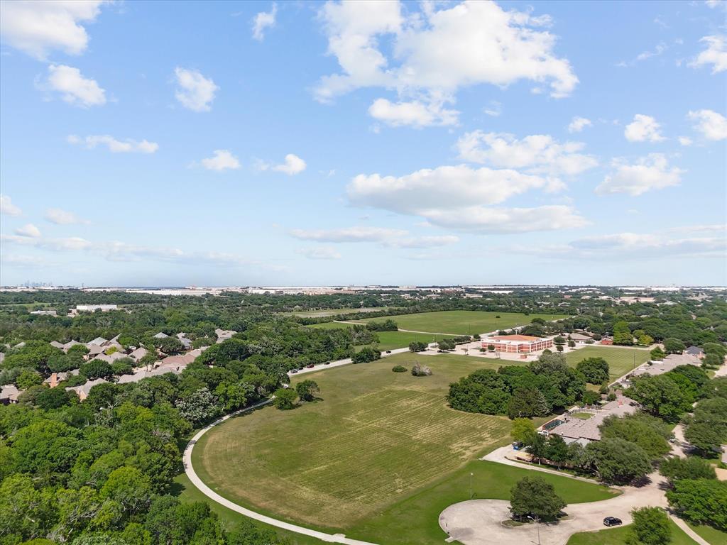 699 West Wintergreen Road DeSoto, TX 75115 - Photo 23 of 29 an aerial view of residential houses with outdoor space and trees