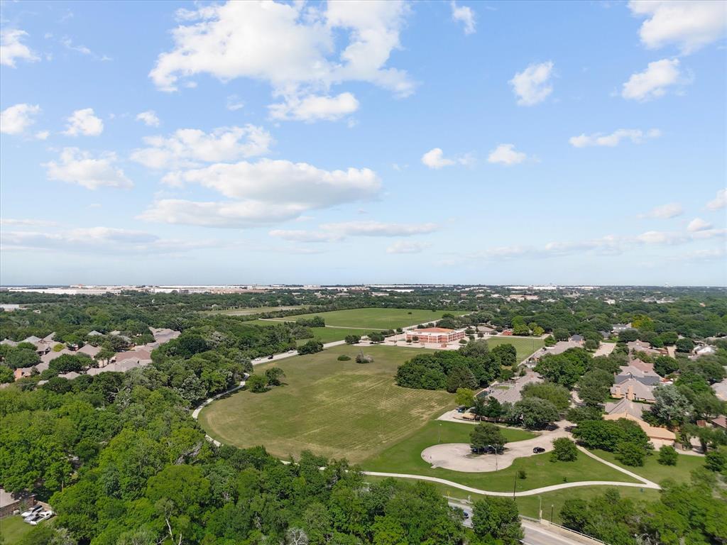 699 West Wintergreen Road DeSoto, TX 75115 - Photo 24 of 29 an aerial view of residential houses with outdoor space and trees