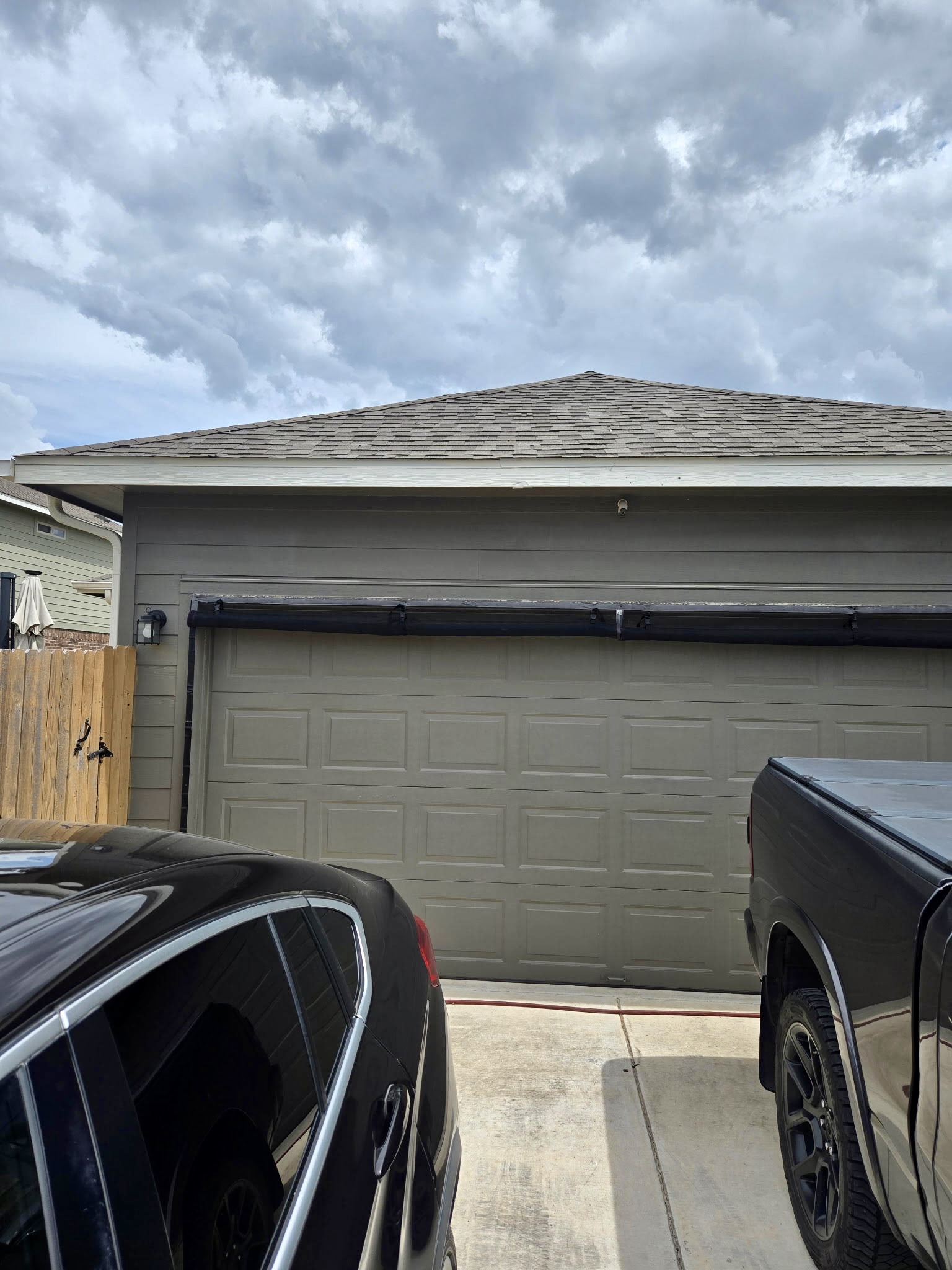 140 Pentro Path Georgetown, TX 78626 - Photo 19 of 37 A well-maintained garage door offers convenient vehicle storage and a secure entry.