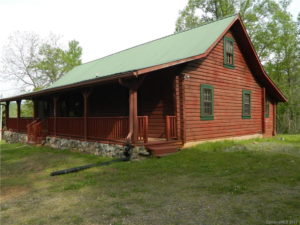 1111 McCurdy Road Hiddenite, NC 28636 - Photo 2 of 20 a front view of a house with a garden