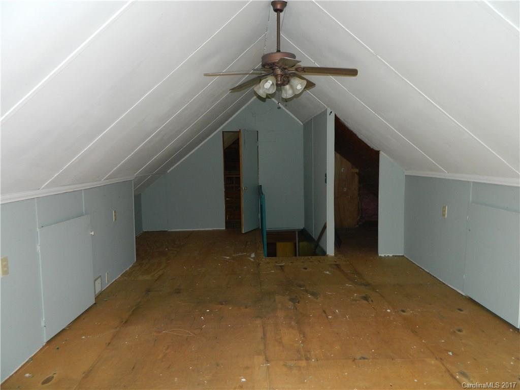 1111 McCurdy Road Hiddenite, NC 28636 - Photo 15 of 20 a view of a hallway with a chandelier