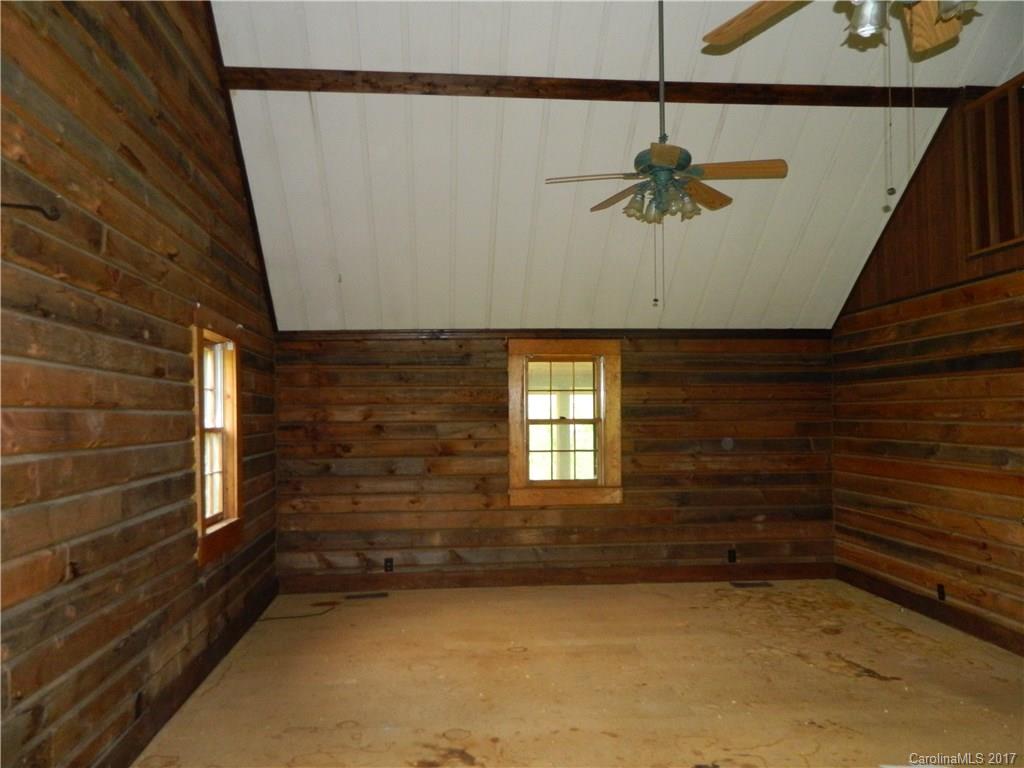 1111 McCurdy Road Hiddenite, NC 28636 - Photo 6 of 20 a view of an empty room with a window