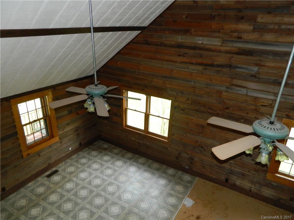 1111 McCurdy Road Hiddenite, NC 28636 - Photo 9 of 20 a view of an empty room with a window