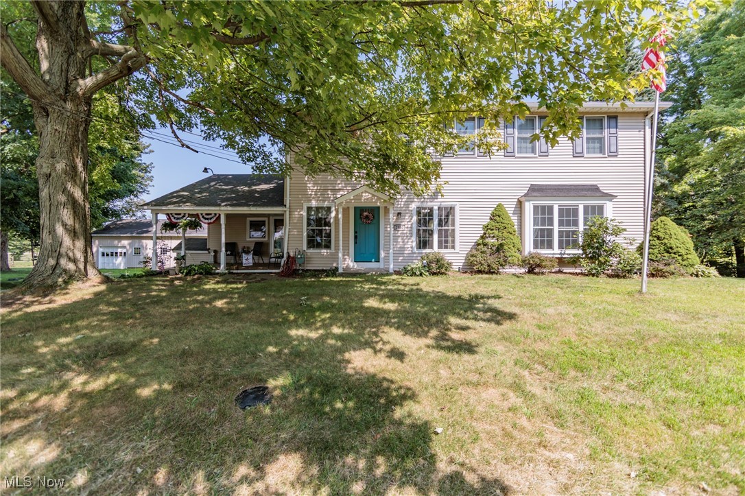 2550 North Ridge Road Vermilion, OH 44089 - Photo 1 of 50 Colonial home featuring a front lawn