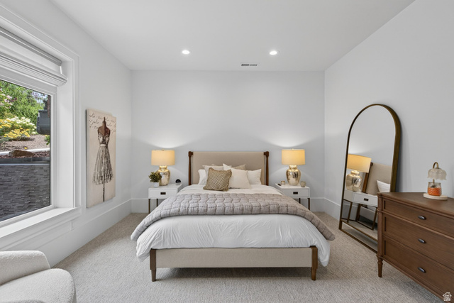 12308 Mariah Circle Draper, UT 84020 - Photo 210 of 293 Guest House Spacious room featuring light-toned carpeting, recessed lighting, and a large window with white trim