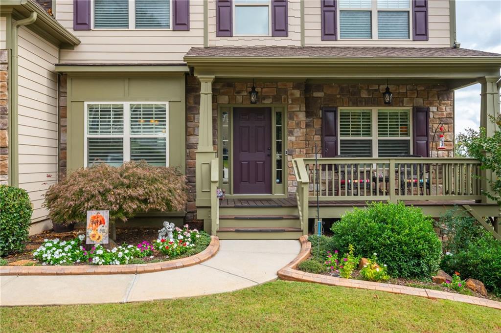 407 Ward Farm Drive Powder Springs, GA 30127 - Photo 2 of 67 a front view of a house having yard