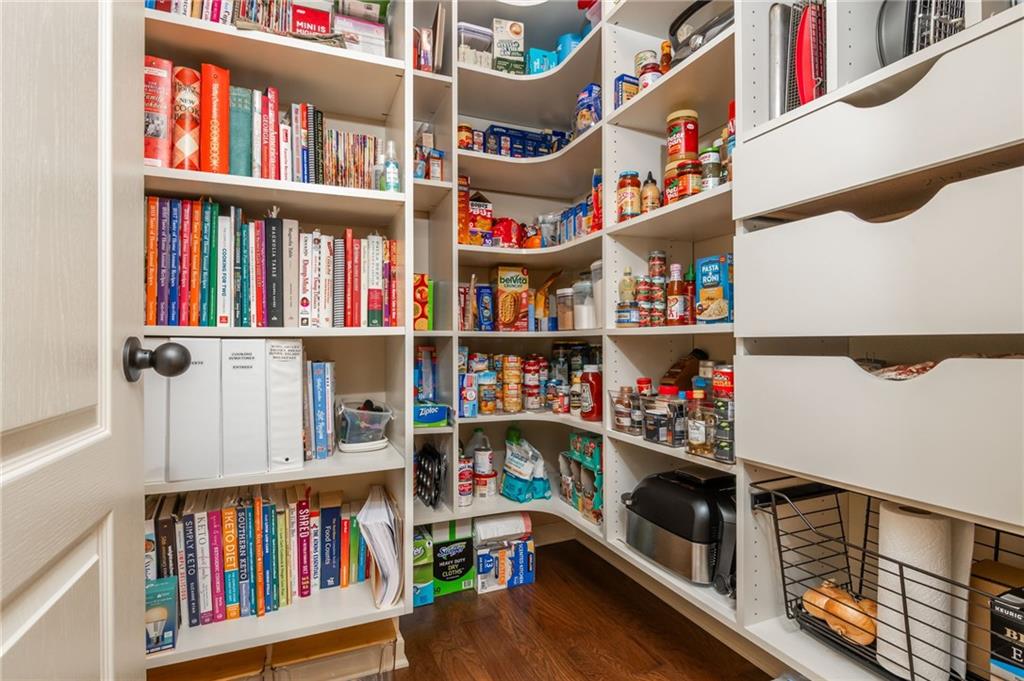 407 Ward Farm Drive Powder Springs, GA 30127 - Photo 28 of 67 a room with book shelf and a book shelf
