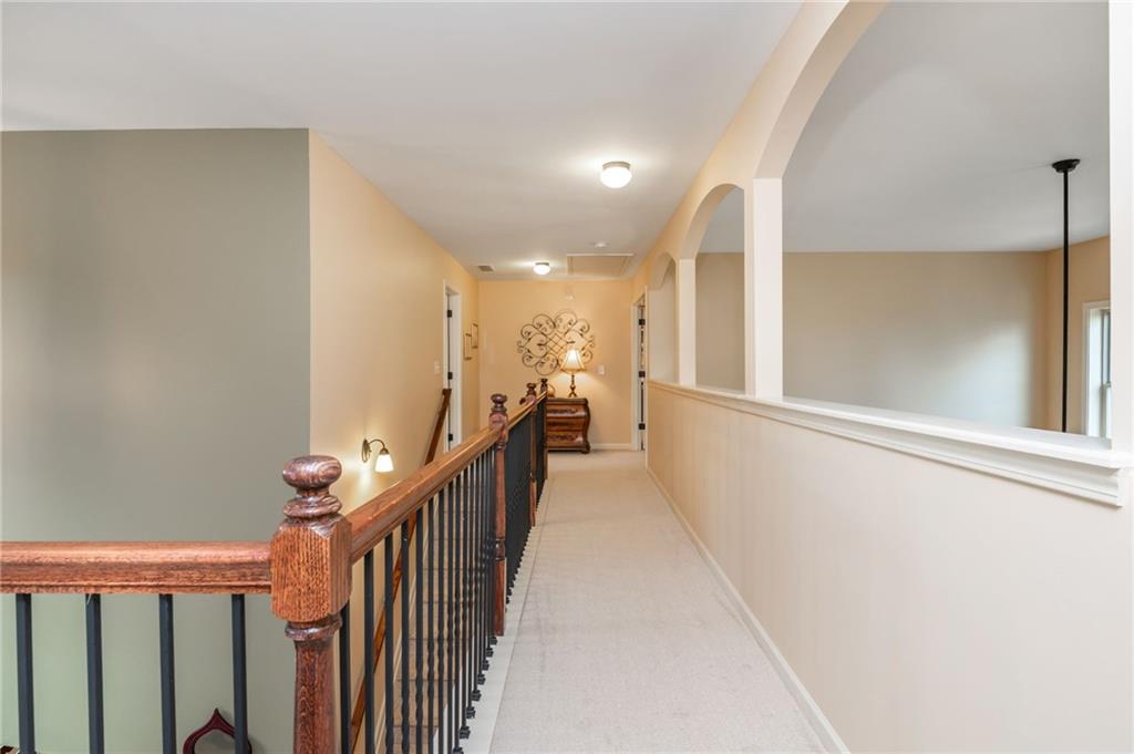 407 Ward Farm Drive Powder Springs, GA 30127 - Photo 31 of 67 a view of a hallway with stairs