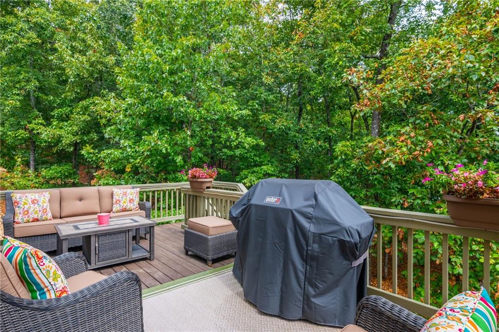 407 Ward Farm Drive Powder Springs, GA 30127 - Photo 55 of 67 a view of sitting area with furniture and wooden fence