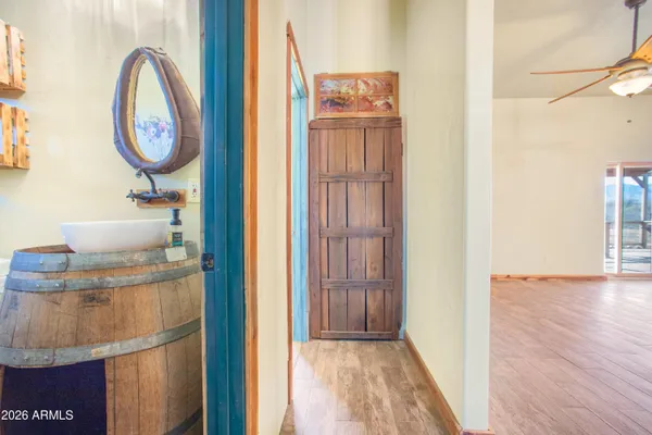 a bathroom with a sink and mirror