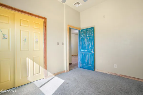 a bathroom with a toilet a sink and a shower