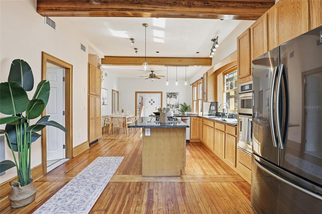 216 Northeast 6th Street Gainesville, FL 32601 - Photo 17 of 36 a view of a living room and kitchen