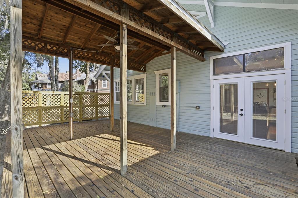 216 Northeast 6th Street Gainesville, FL 32601 - Photo 30 of 36 a view of a balcony with wooden floor