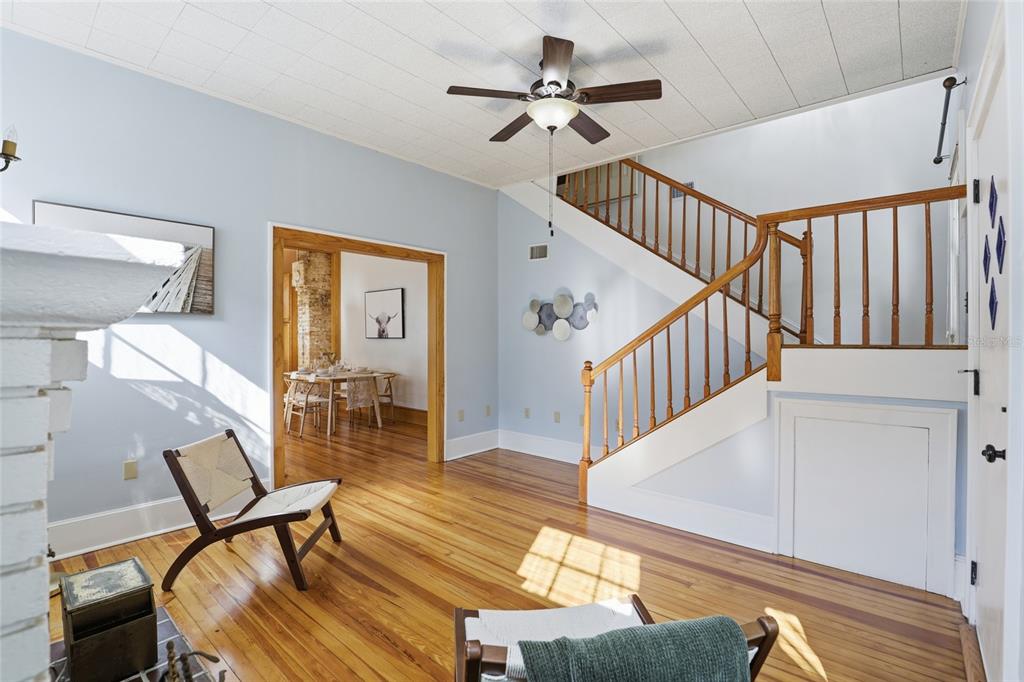 216 Northeast 6th Street Gainesville, FL 32601 - Photo 9 of 36 a view of a livingroom with furniture and stairs