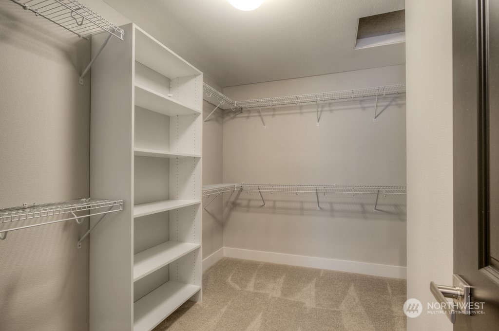 2 177th St S Street West, Unit IW 88 Bothell, WA 98012 - Photo 23 of 26 a bathroom with a bathtub