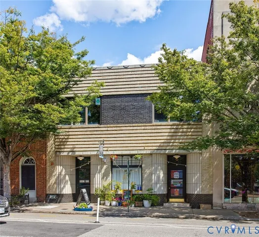 a front view of a house with a garage