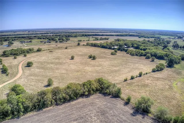 a view of a beach with a city view