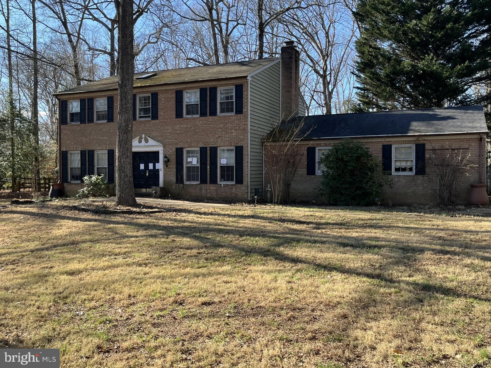 Charming brick home in a serene setting.