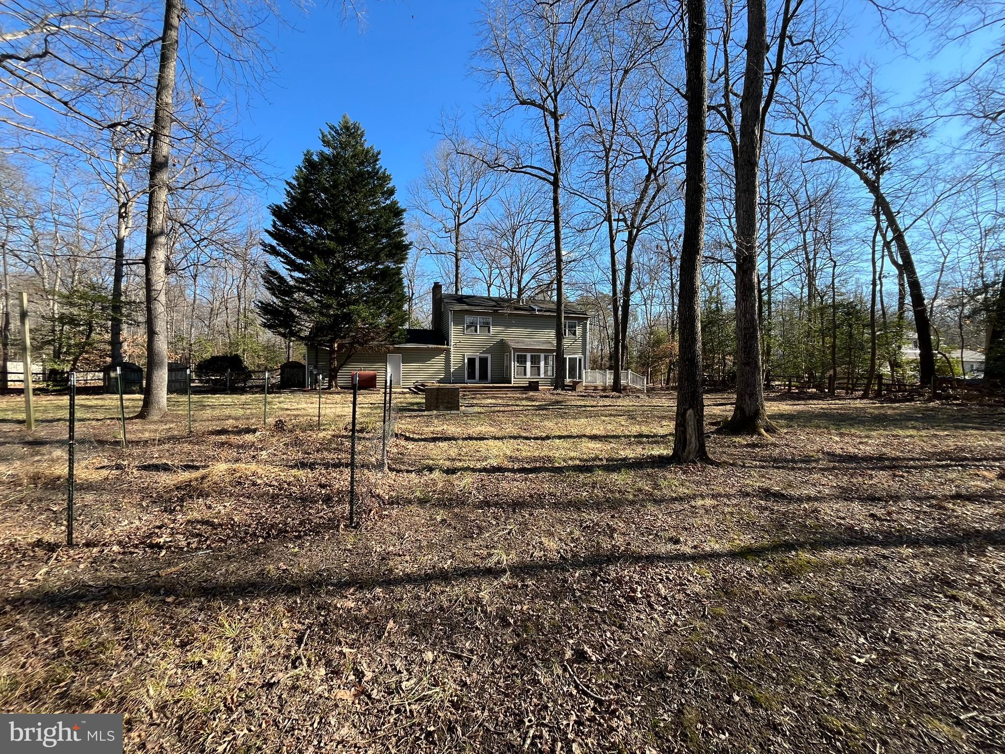 4178 Columbia Park Road Pomfret, MD 20675 - Photo 16 of 16 Serene home nestled among tall trees.