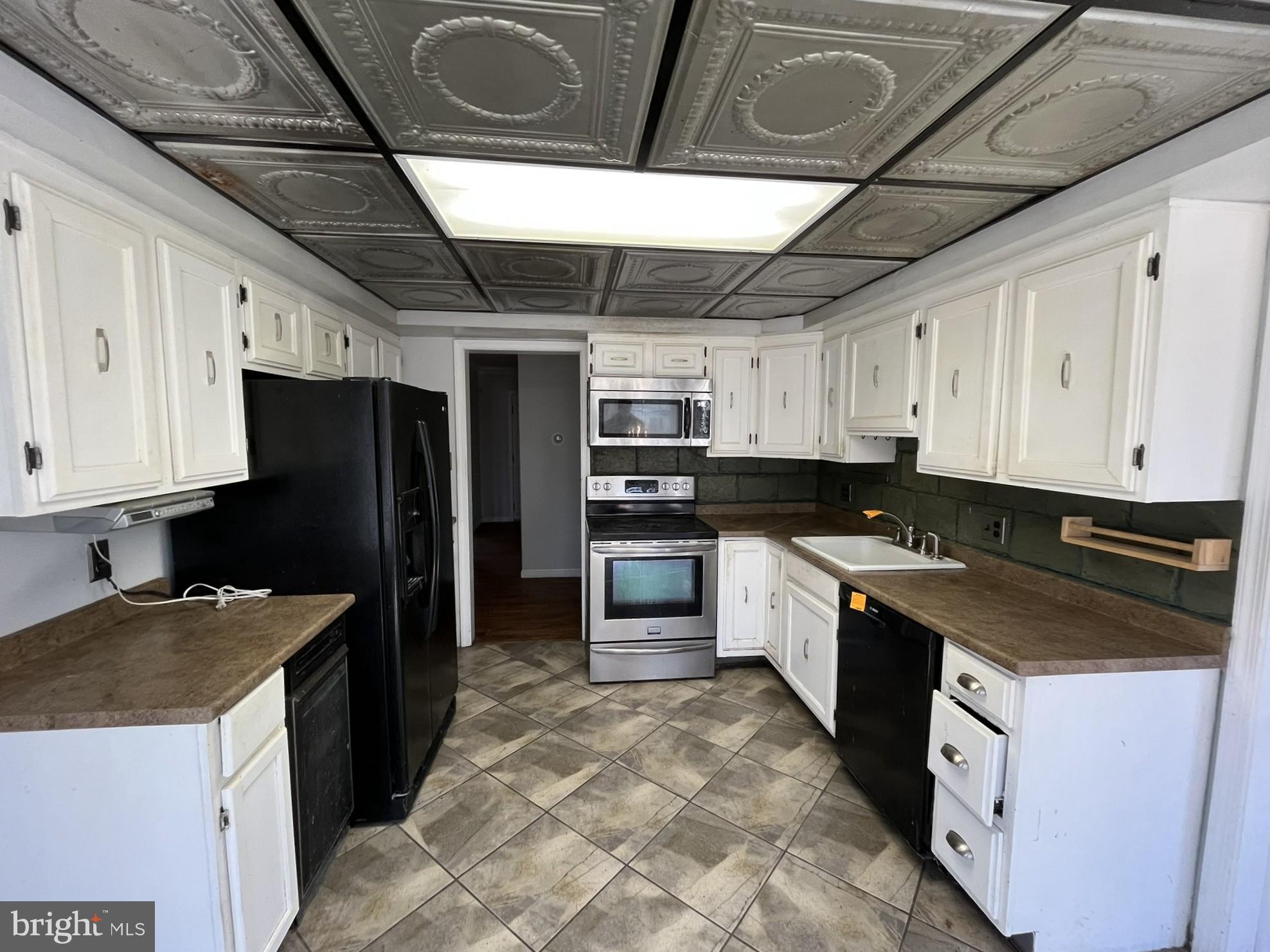 4178 Columbia Park Road Pomfret, MD 20675 - Photo 3 of 16 Charming kitchen with classic design elements.