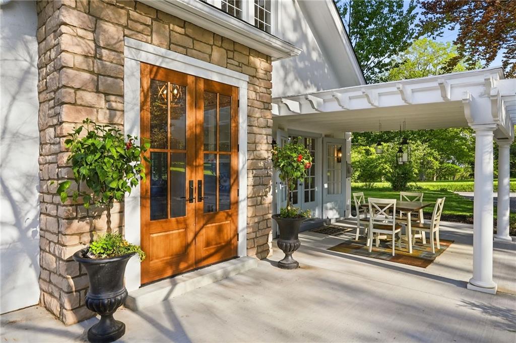 3944 Bakerstown Road Gibsonia, PA 15044 - Photo 13 of 50 a view of porch with a table and chairs and potted plants