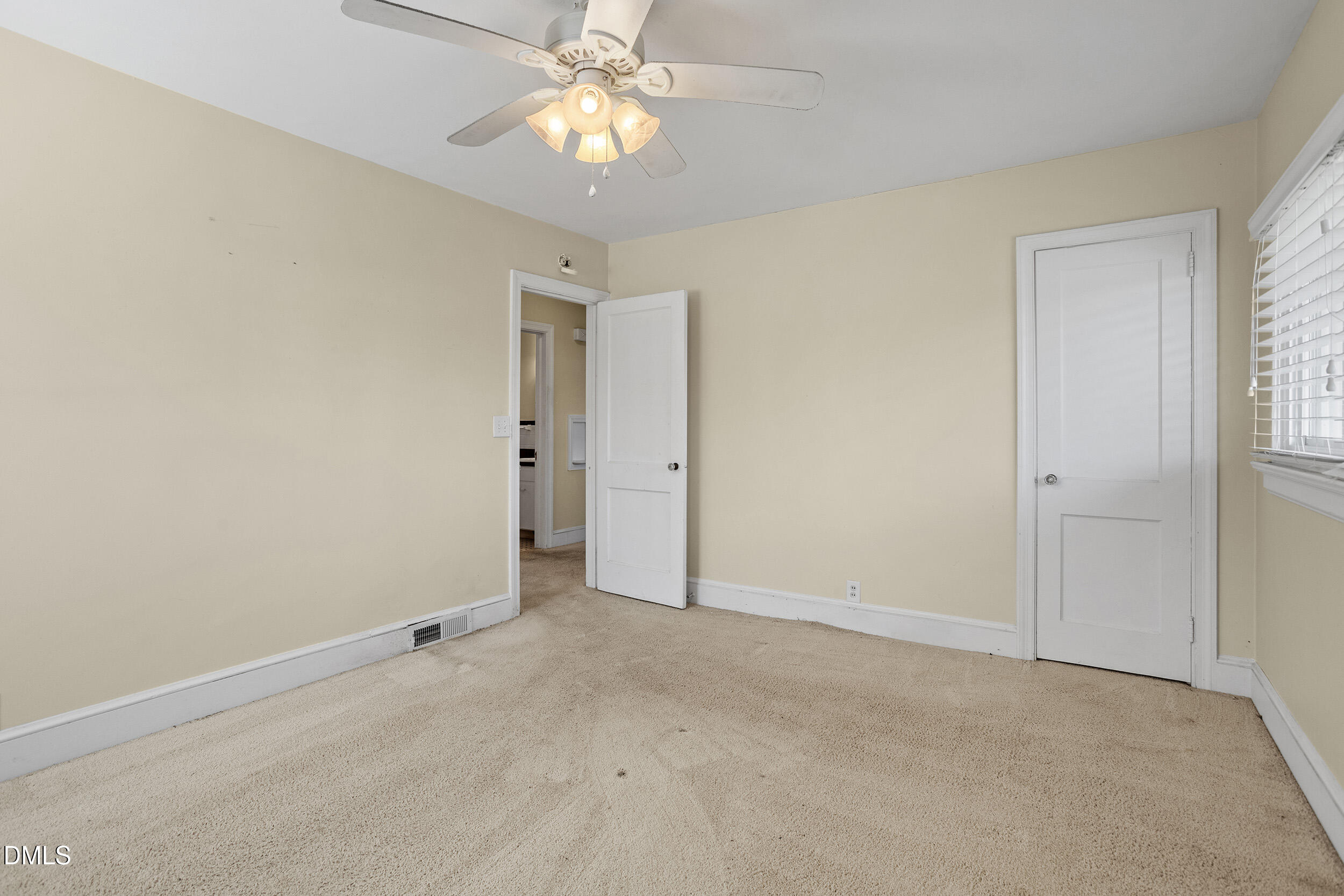 5011 Old Stage Road Raleigh, NC 27603 - Photo 18 of 29 an empty room with a empty space and a ceiling fan