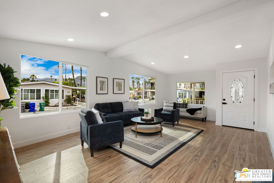 142 Capri Rancho Mirage, CA 92270 - Photo 2 of 26 a living room with furniture and a window