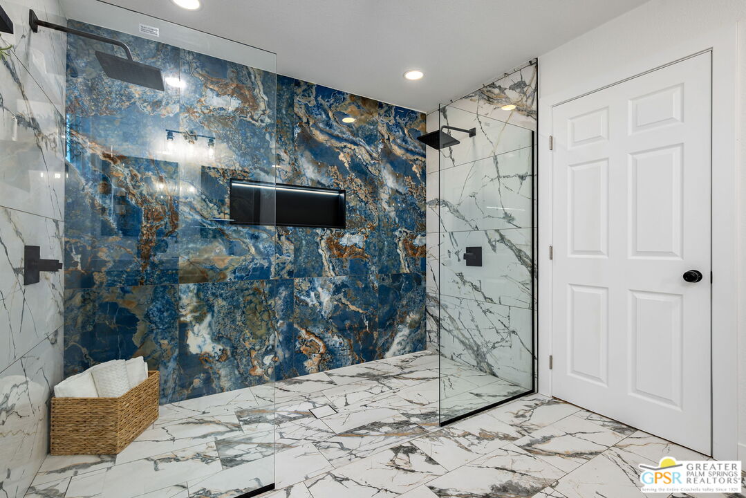 142 Capri Rancho Mirage, CA 92270 - Photo 9 of 26 a bathroom with a shower and a sink